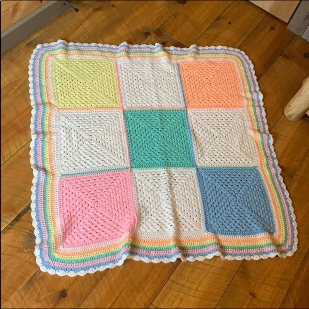 Handmade crochet baby blanket in pastel colors / colorblock pattern